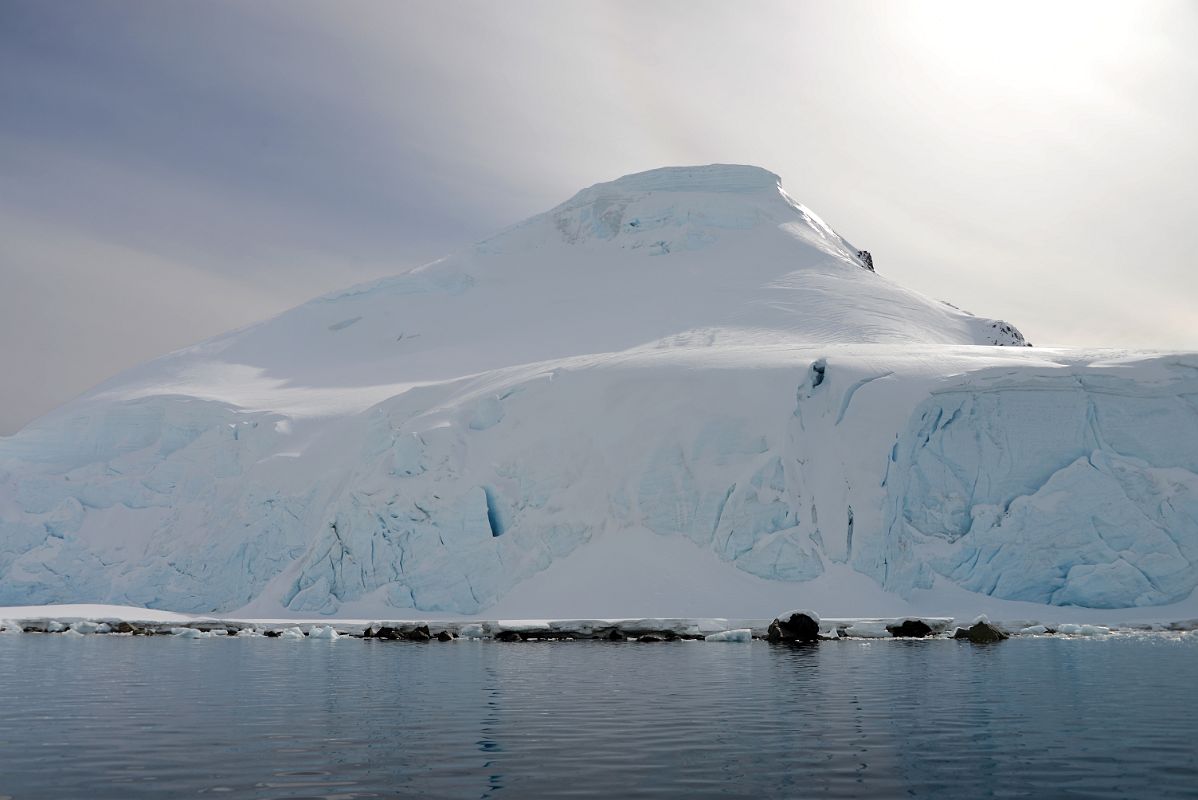 16B Steep Glacier Clad Southern Cuverville Island From Zodiac On Quark Expeditions Antarctica Cruise